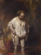 REMBRANDT Harmenszoon van Rijn, A woman bathing.